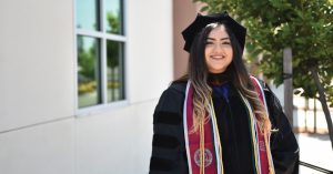 woman in graduation regalia