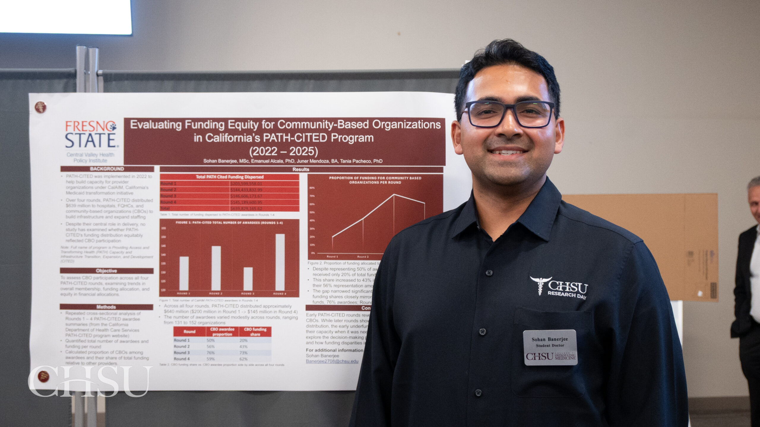student by poster at CHSU Research Day