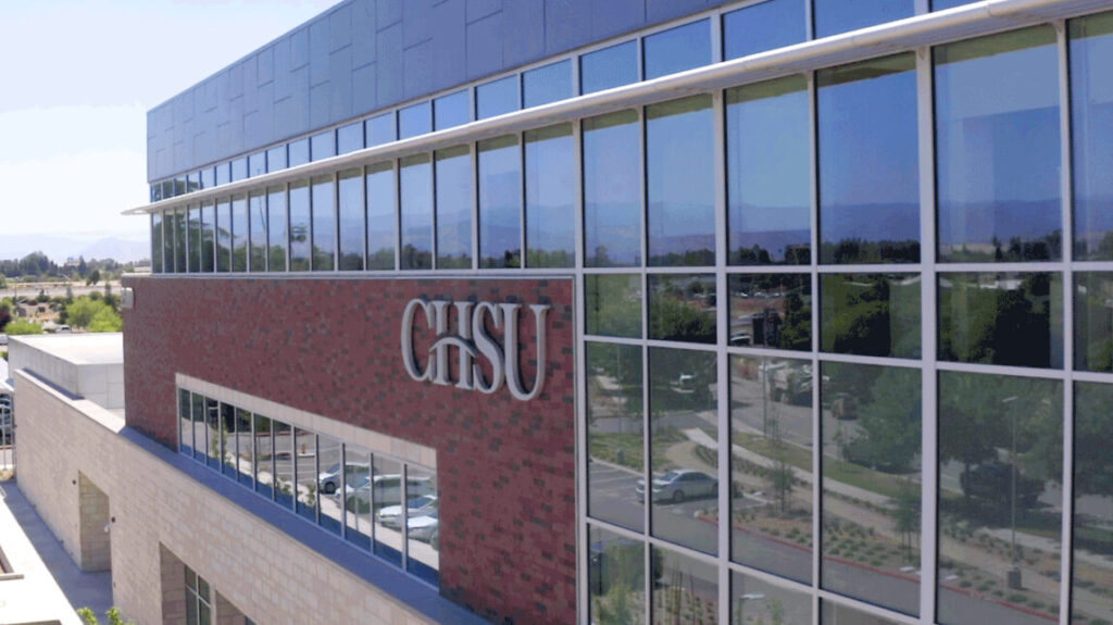 Side of building with windows and CHSU sign
