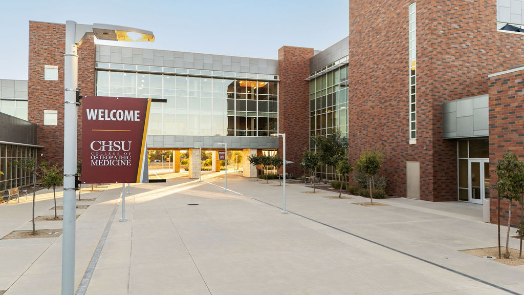 CHSU College of Osteopathic Medicine Welcome sign in courtyard of building