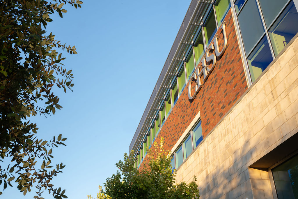 CHSU sign on side of COM building