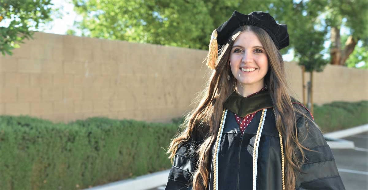 Irina Boginski in graduation regalia