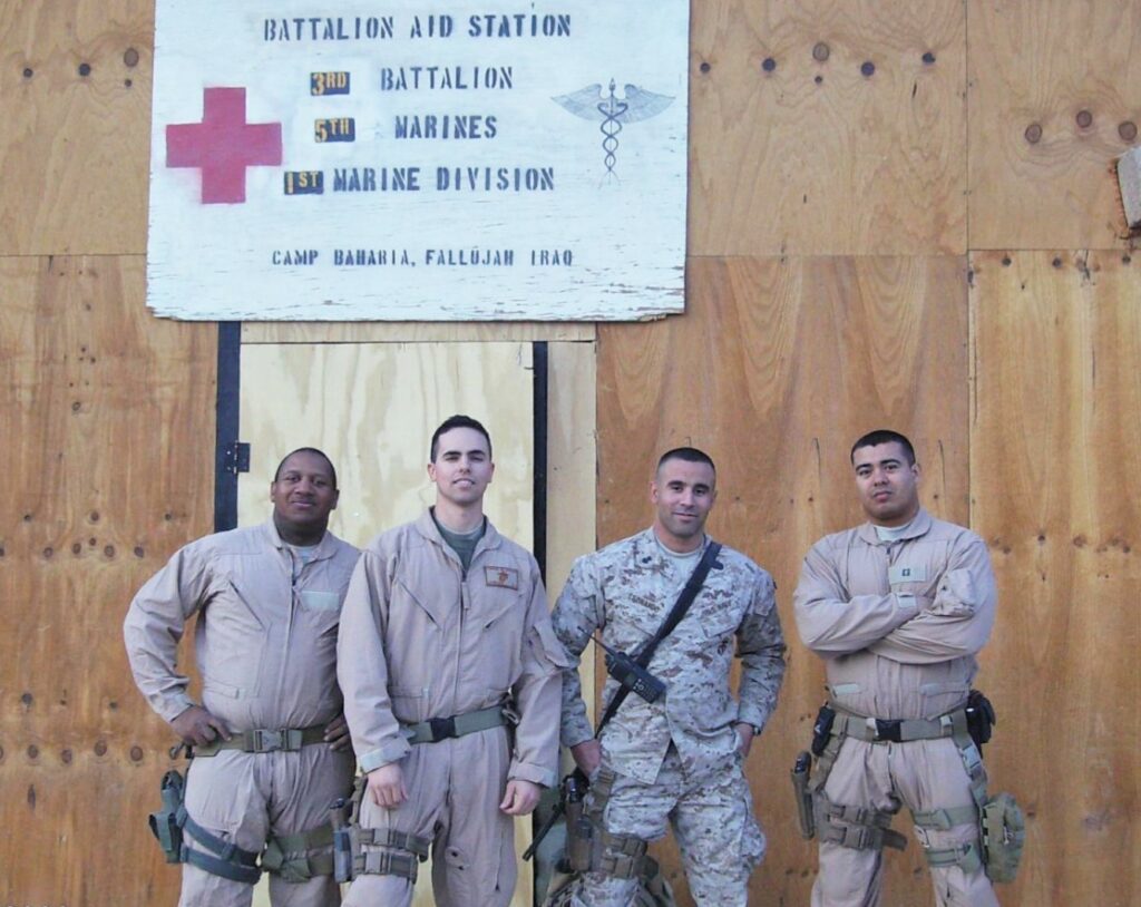 Dr. Luis Bautista in fatigues with Navy colleagues